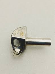 Looper with hole (button stitch)