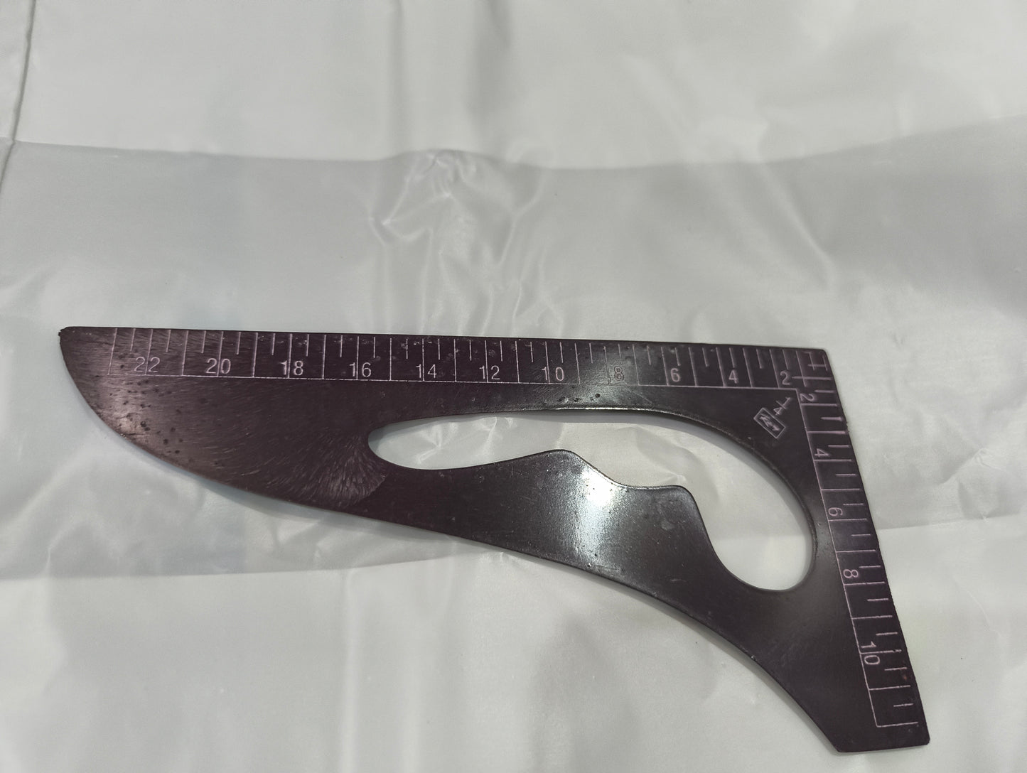 Triangle scale plastic